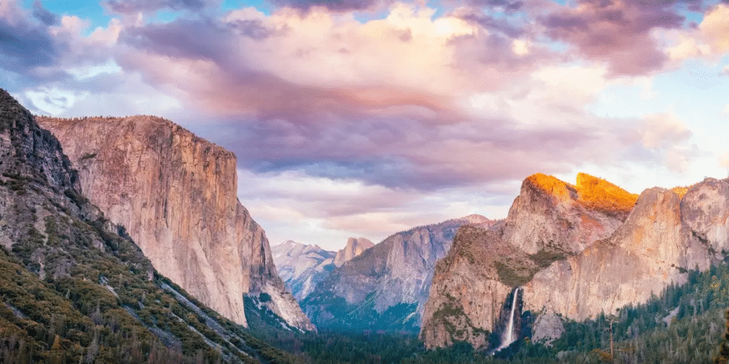 Best National Parks in the USA 2026: Complete Travel Guide featuring scenic mountain landscapes, forests, hiking trails, wildlife, lakes, and iconic national park views across the United States.